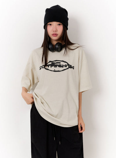 oversized-washed-graphic-tee-iu509 / light beige