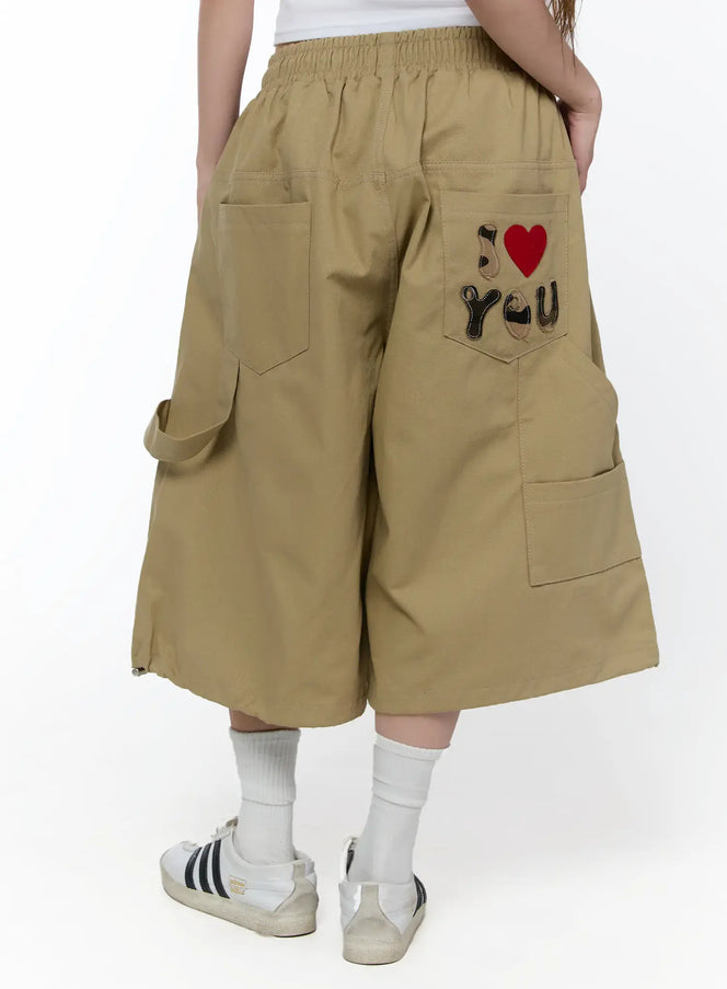 text-embroidered-bermuda-shorts-ca520 / Beige