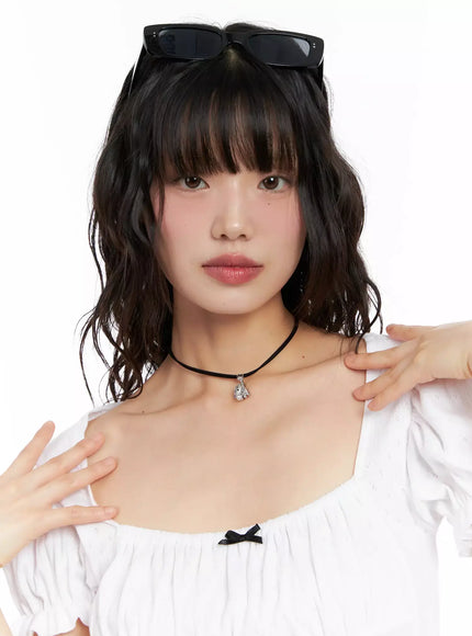 acc-onkapo-teddy-with-a-ball-black-cord-necklace-cg507