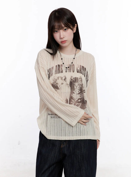 graphic-oversized-sheer-long-sleeve-top-cs530