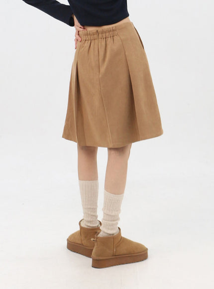 suede-pleated-midi-skirt-in310