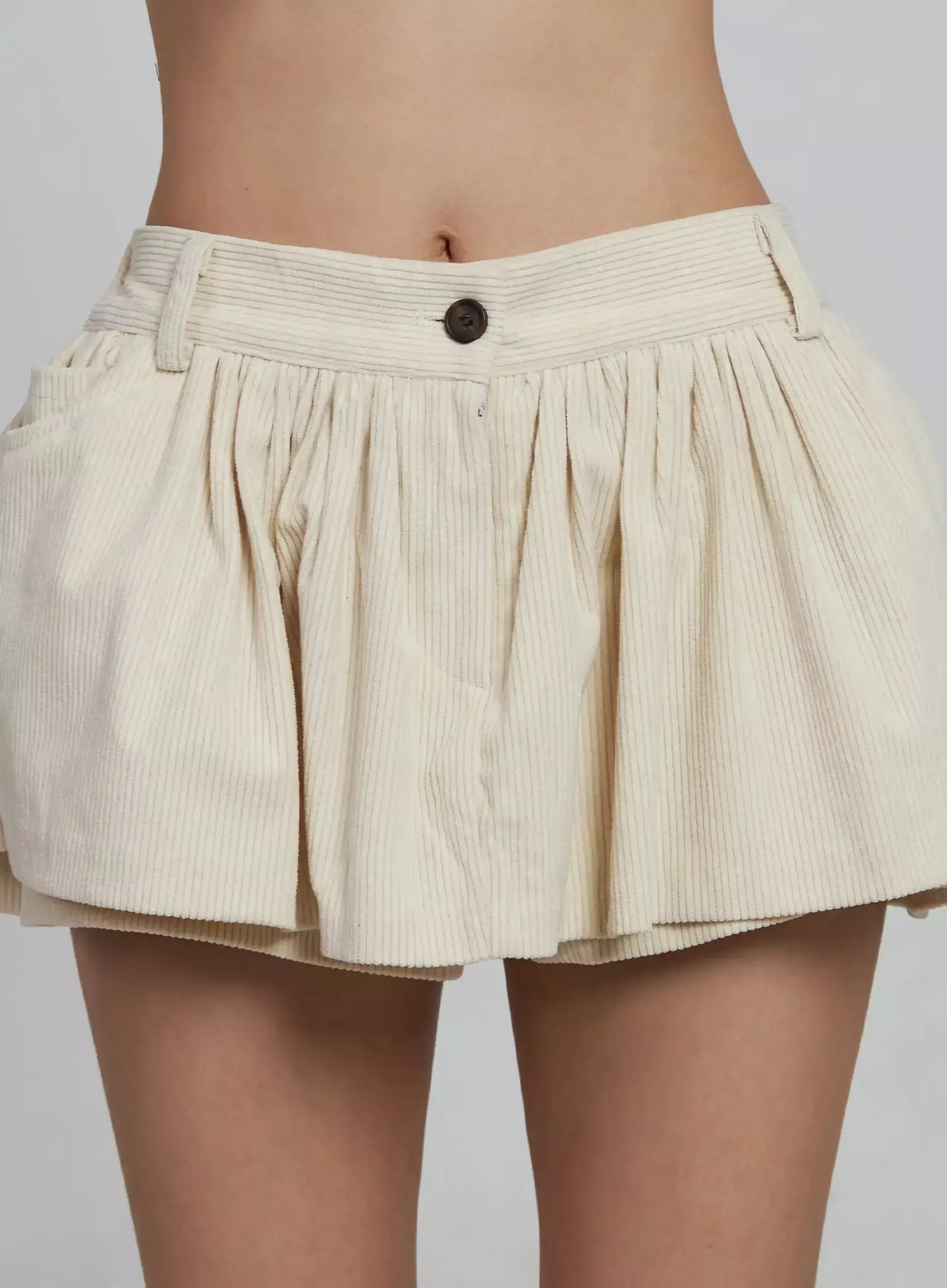 pleated-corduroy-mini-skort-im520