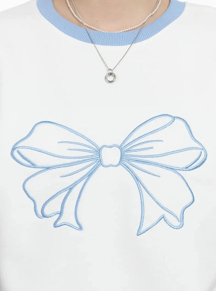 ribbon-embroidered-short-sleeve-top-iy511