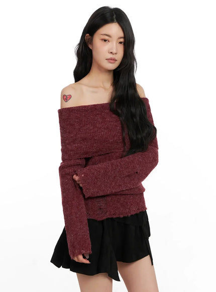 distressed-off-shoulder-sweater-in528