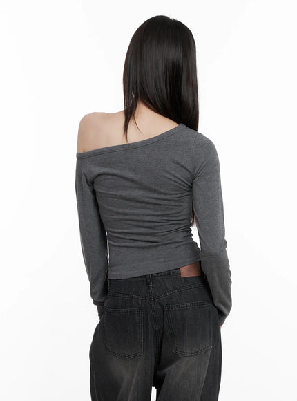 asymmetrical-eyelet-long-sleeve-top-cg519