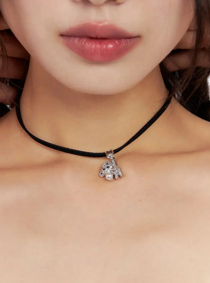 acc-onkapo-teddy-with-a-ball-black-cord-necklace-cg507