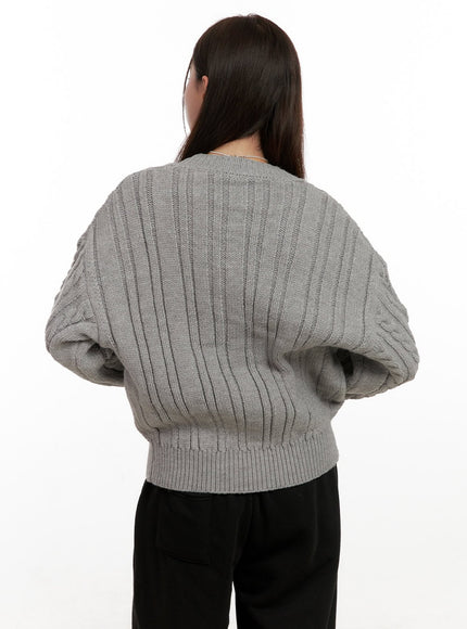 buttoned-v-neck-cable-knit-sweater-on422