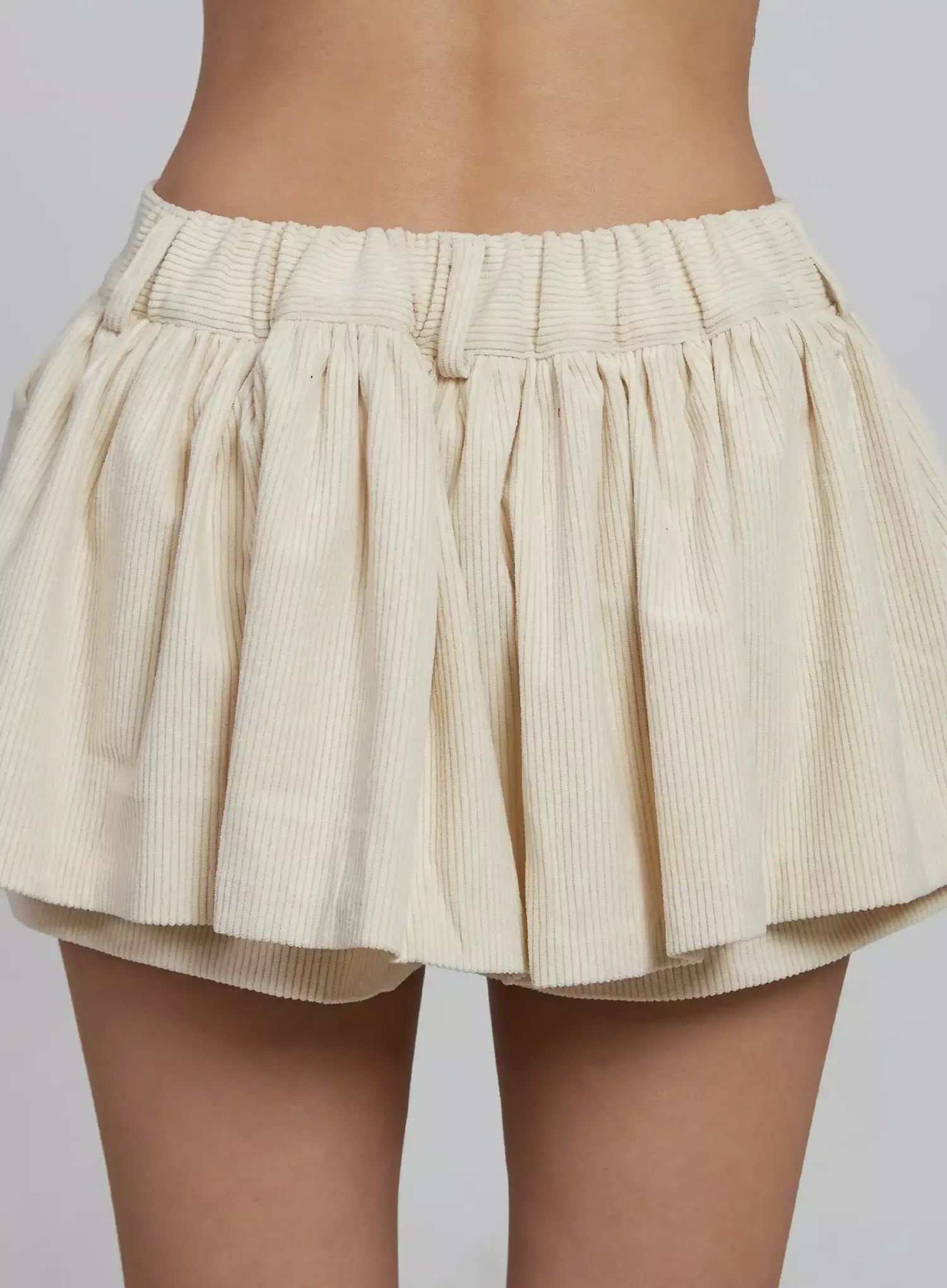 pleated-corduroy-mini-skort-im520