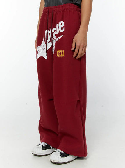 mens-graphic-parachute-string-sweatpants-red-iy513