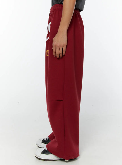 mens-graphic-parachute-string-sweatpants-red-iy513