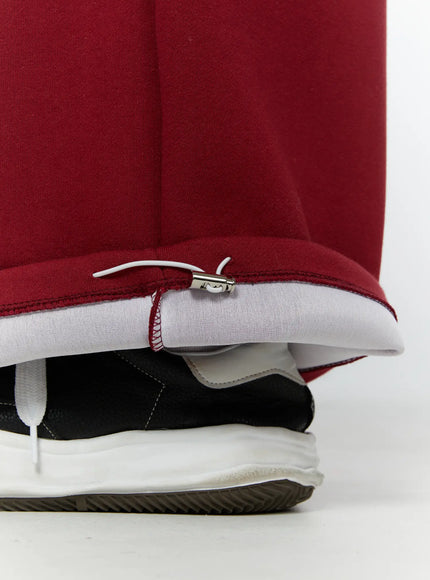 mens-graphic-parachute-string-sweatpants-red-iy513
