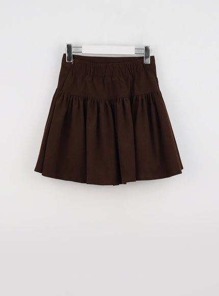 pleated-corduroy-skirt-with-buckle-io324
