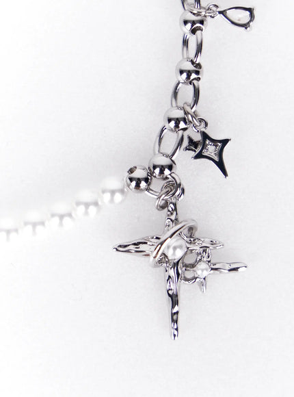 pearl-cross-charm-bracelet-iy520