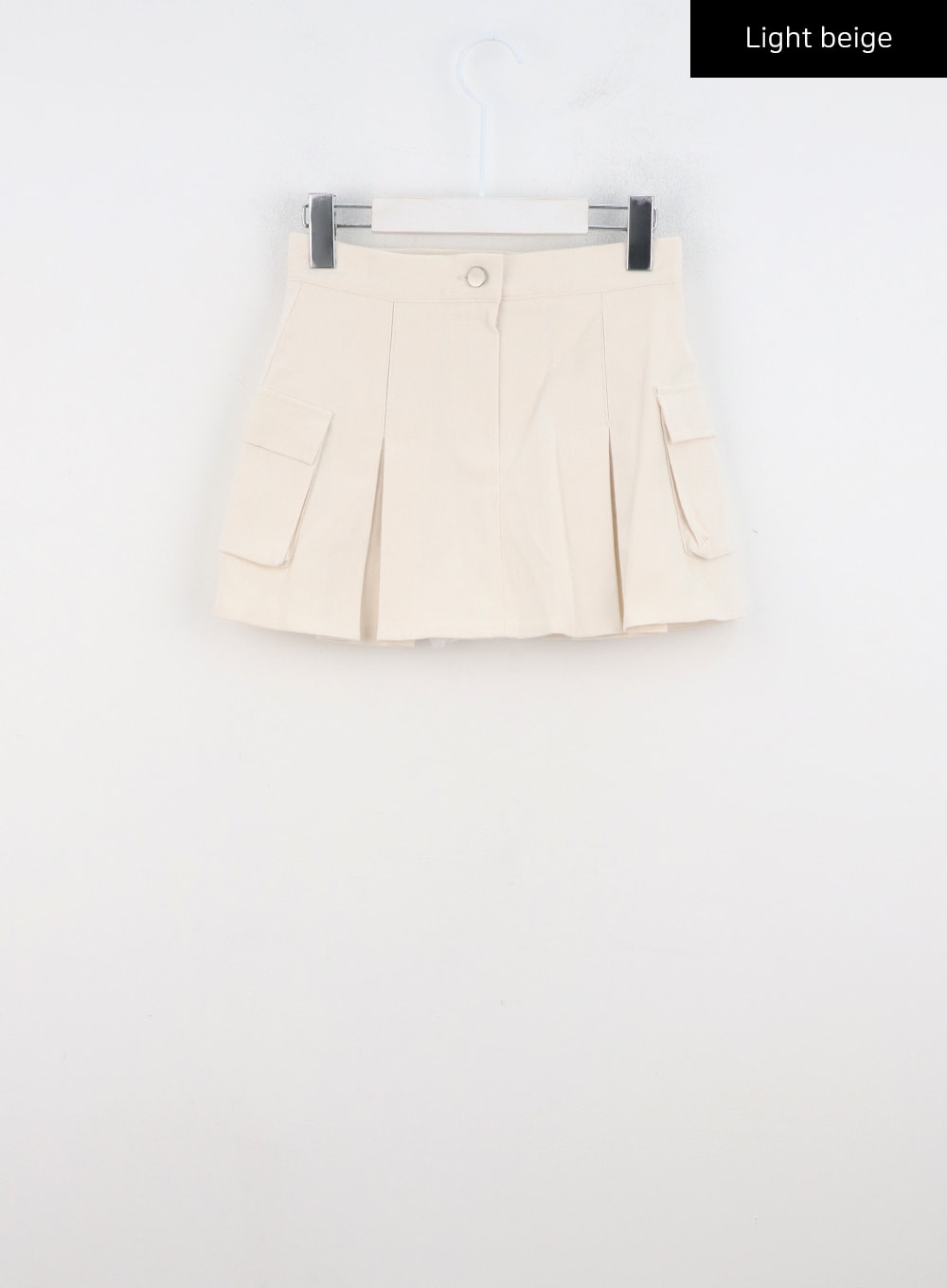 pocket-pleated-mini-skirt-cn317 / Light beige