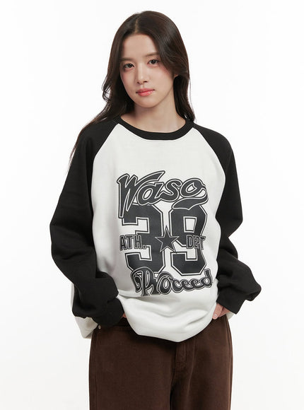 cozygraphic-raglan-sweatshirt-on429 / Black