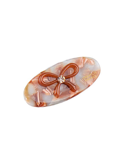 oval-ribbon-hairpin-cj515 / Dark brown