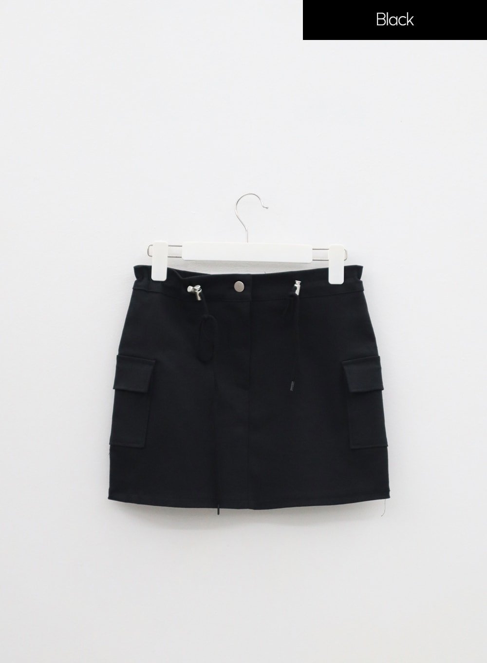 Cargo buckle outlet skirt